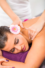 Image showing Beautiful woman having a back massage