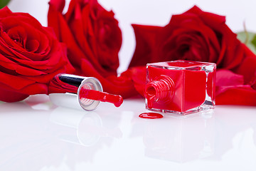 Image showing Elegant red nail varnish in a stylish bottle