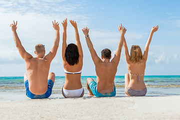 Image showing young happy friends havin fun on the beach