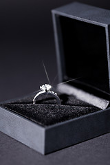 Image showing Jewelry box with elegant silver ring