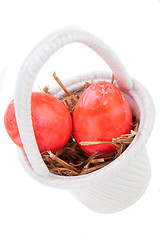 Image showing Basket of brightly coloured Easter Eggs