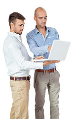 Image showing Two businessmen consulting a laptop