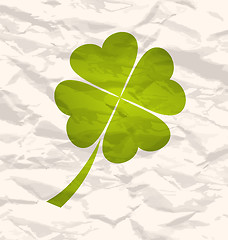 Image showing Clover with four leaves on crumpled paper