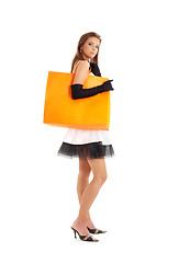 Image showing elegant lady with orange shopping bag