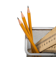 Image showing Some yellow pencils and wooden ruler in support