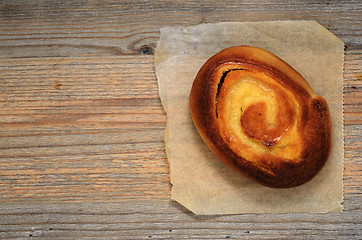 Image showing fresh bun dallas on wooden table