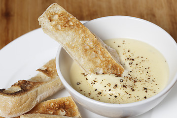 Image showing Toast  in cheese dip sauce