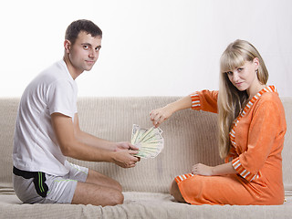 Image showing Husband and wife share the salary