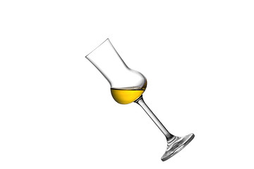 Image showing A tilted grappa glass