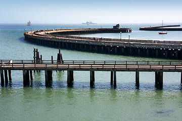 Image showing Winding wooden pier