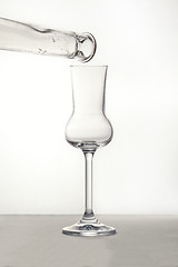 Image showing Filling up the grappa glass