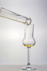 Image showing Filling up the grappa glass