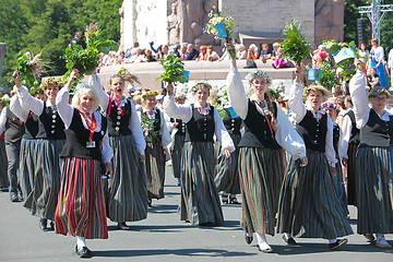 Image showing RIGA, LATVIA - JULY 07: People in national costumes at the Latvi