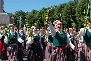 Image showing RIGA, LATVIA - JULY 07: People in national costumes at the Latvi