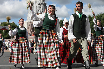 Image showing RIGA, LATVIA - JULY 07: People in national costumes at the Latvi