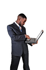 Image showing Black man with laptop.