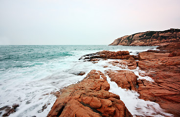 Image showing rocky sea coast and blurred water in shek o,hong kong 