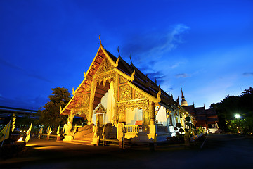 Image showing Wat Phra Singh temple at sunset in Chiang Mai, Thailand. 