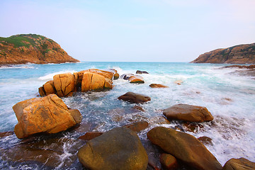 Image showing rocky sea coast and blurred water in shek o,hong kong 