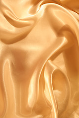 Image showing Smooth elegant golden silk as background 