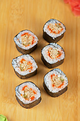 Image showing sushi rolls with tobico and pancake