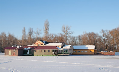 Image showing Floating hotel on a winter lake.