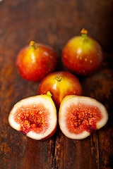 Image showing fresh figs over old wood