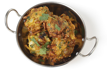 Image showing Onion bhajis in a kadai top view