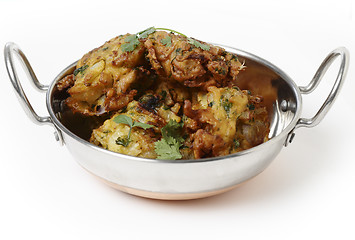 Image showing Onion bhajis in a kadai side view