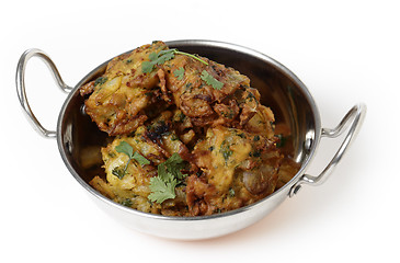 Image showing Onion bhajis served in a kadai