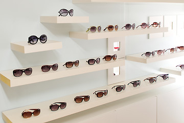 Image showing wall of sunglasses