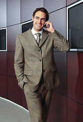 Image showing Businessman with mobile phone j