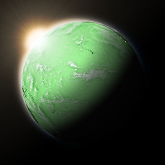 Image showing Sun over Pacific Ocean on green planet Earth