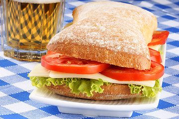 Image showing Italian panino sandwich and beer