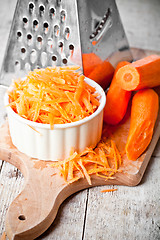 Image showing metal grater and carrot