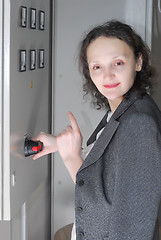 Image showing Woman working on telecommunication equipment