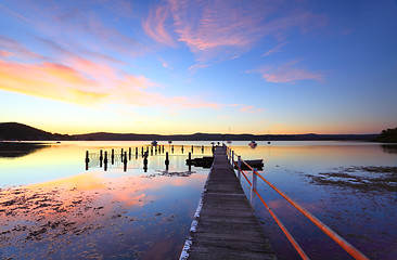 Image showing Colourful sunset and water reflections at Yattalunga Australia