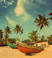 Image showing old fishing boats on beach - vintage retro style