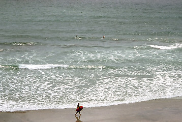 Image showing Surfer on beach