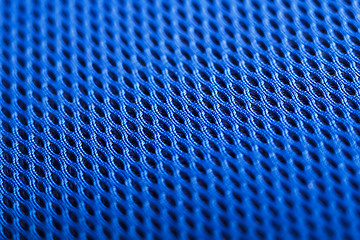 Image showing Blue background. Mesh fabric texture. Macro