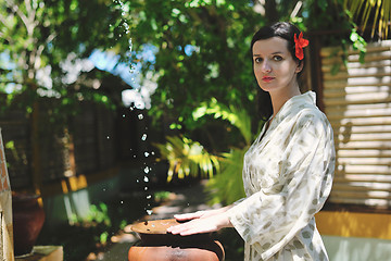 Image showing spa treatment at tropical resort