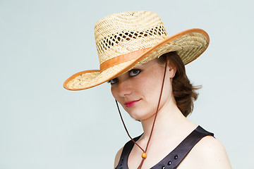 Image showing girl in a straw hat