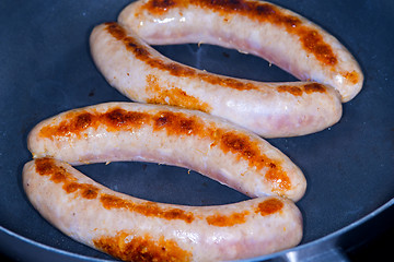 Image showing German sausage Bratwurst in a pan