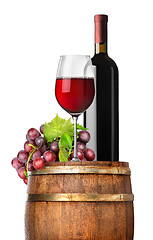 Image showing Grape and wine on a barrel