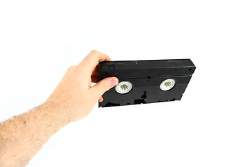 Image showing VHS video tape in the human hand