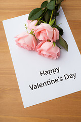 Image showing Pink rose and gift card message