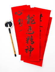 Image showing Writing of chinese new year calligraphy, phrase meaning is bless