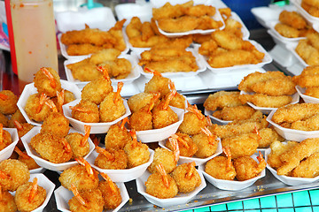 Image showing Fried prawns in street market