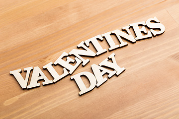 Image showing Wooden letters forming phrase Valentines day over wooden backgro