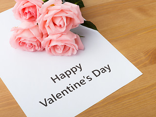 Image showing Pink rose and gift card message